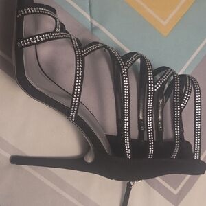 Jennifer Lopez Black Strappy Heels with Silver Accents